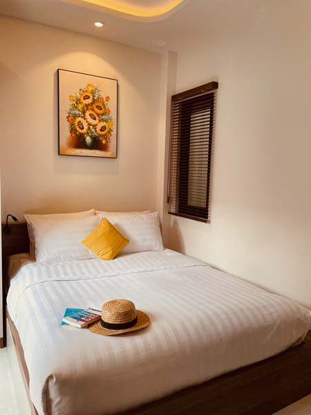 Phòng nghỉ hiện đại ấm cúng tại Khách sạn Soi by La Doma Express